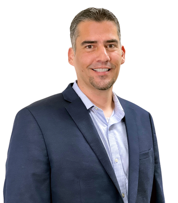 Portrait of Jerett Saavedra, Associate Broker / Realtor®.