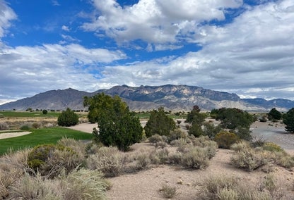 Blue sky and clouds over golf course, near Ladera Heights, NM